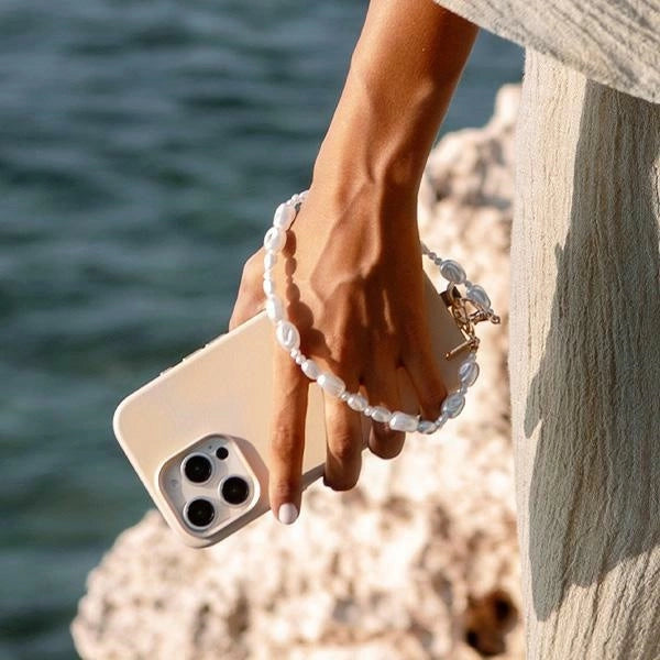 Uniq Coehl Perla Universal-Handschlaufe für Handys – Weiß